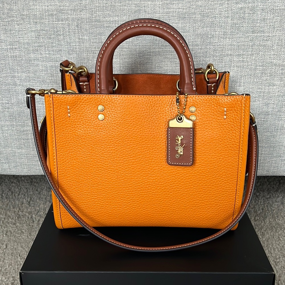 Coach rogue 25 in brass/papaya multi